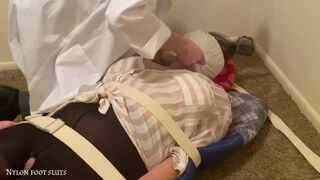 Sexy Foot Fetish Girl Patient in Medical Restraints and Spitmask by a Teasing Doctor Part1